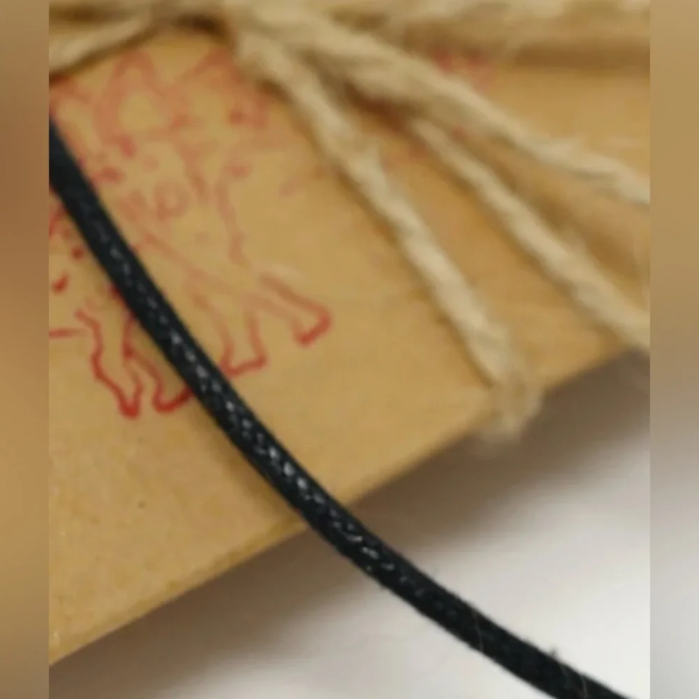 Shark Tooth Pendant With Black Cord Necklace